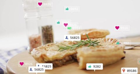 Rustic golden hand pie with rosemary garnish on wooden board with social app icons