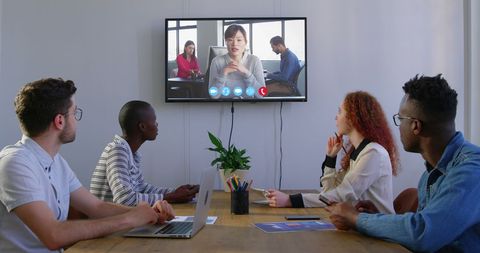 Multicultural Business Team in Virtual Meeting Environment