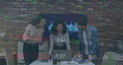 Executives Analyzing Digital Financial Data in Modern Office