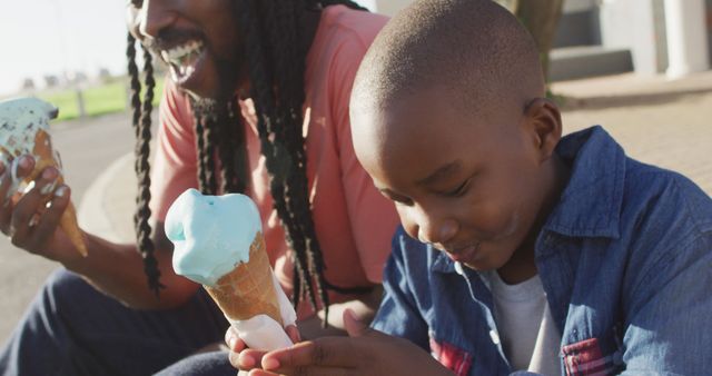 Father and Son Enjoying Ice Cream on Sunny Day - Download Free Stock Images Pikwizard.com