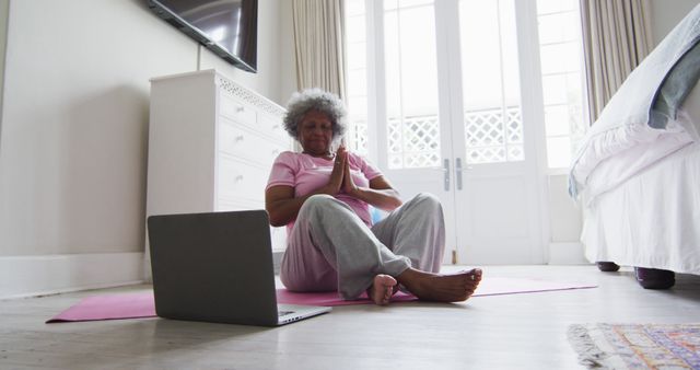 Senior Woman Practicing Online Yoga at Home - Download Free Stock Images Pikwizard.com