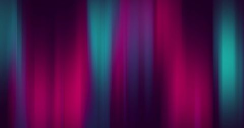 Abstract Green and Purple Light Trails in Motion
