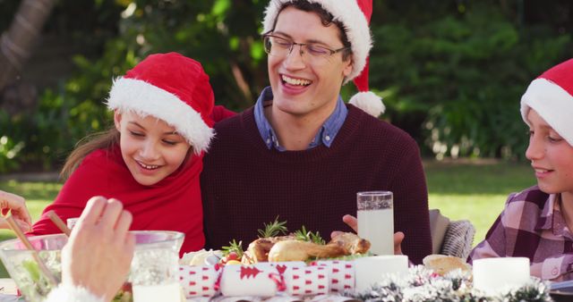 Happy Family Having Christmas Dinner Outdoors - Download Free Stock Images Pikwizard.com