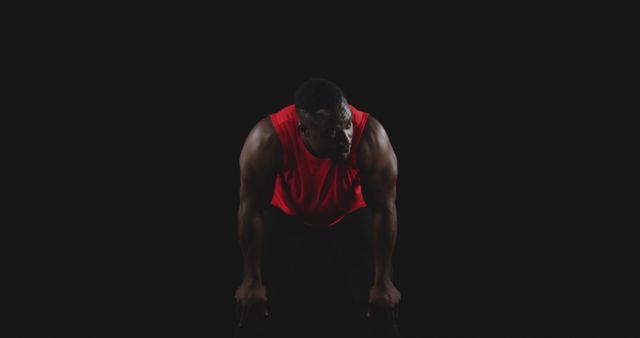 Determined Athlete Resting Between Exercises in Dark Room - Download Free Stock Images Pikwizard.com