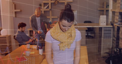 Financial Analysis with Teamwork and Digital Graphics in Modern Office