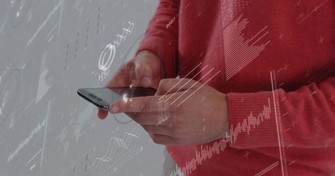 Businessman Using Smartphone with Overlay Graphics for Data and Reports
