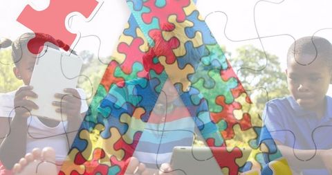 Autism Awareness: Children Learning with Technology and Ribbon Symbol - Download Free Stock Images Pikwizard.com