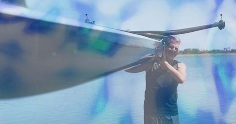 Senior Athlete with Racing Shell by Tranquil Lakeshore