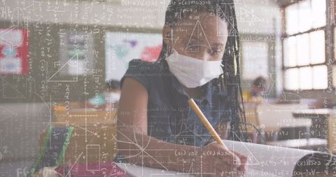 Focused student with math overlay in classroom