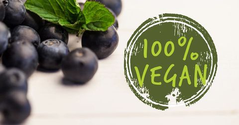 Fresh organic blueberries with 100 percent vegan label