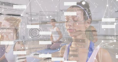 Female athlete wearing purple top and headband training with biometric overlay in fitness class