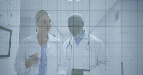 Clinicians collaborating in hospital corridor with digital data overlay and tablet