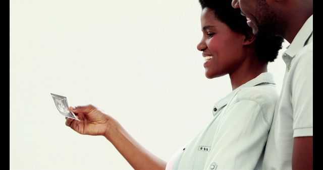 Expectant Couple Looking at Ultrasound with Happiness - Download Free Stock Images Pikwizard.com