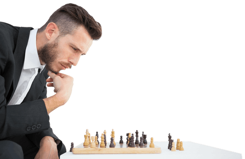 Transparent businessman strategizing while playing chess