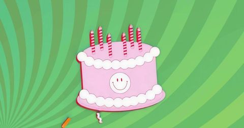 Cheerful pink cake with candles on bold emerald green background