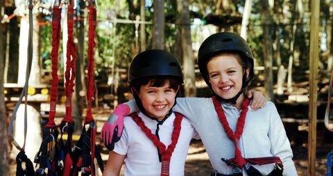 Happy Children in Safety Gear for Outdoor Adventure