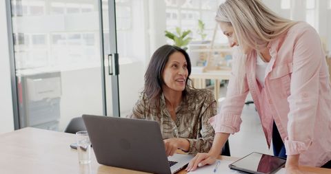 Diverse Female Colleagues Collaborating in Office Environment - Download Free Stock Images Pikwizard.com