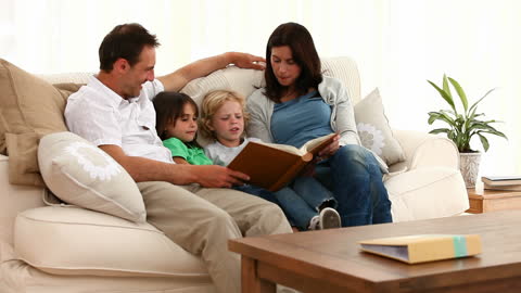 Family Enjoying Quality Time Together Reading at Home