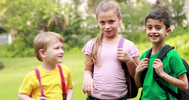 Happy School Kids with Backpacks Outdoors - Download Free Stock Images Pikwizard.com