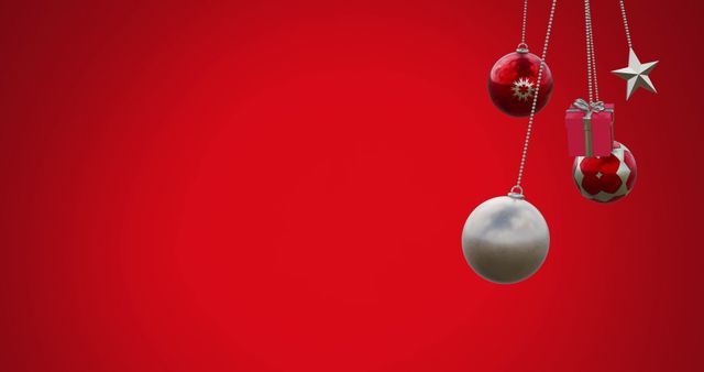 Christmas Ornaments Hanging Against Vibrant Red Background - Download Free Stock Images Pikwizard.com