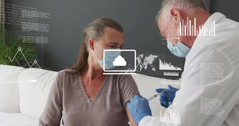 Nurse administering vaccine to woman at home with digital health data overlays