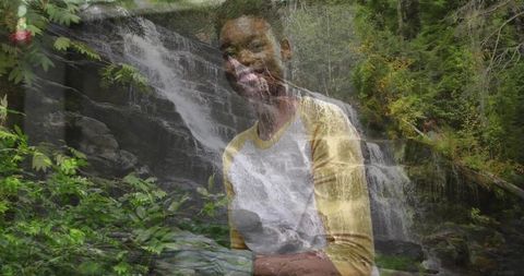 Woman Embracing Nature at Serene Forest Waterfall