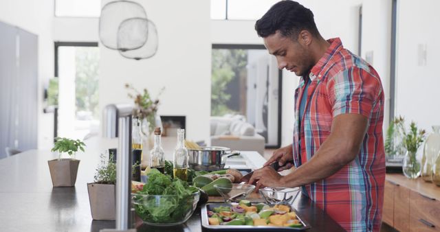 Biracial Man Preparing Fresh Vegetables in Modern Kitchen at Home - Download Free Stock Images Pikwizard.com