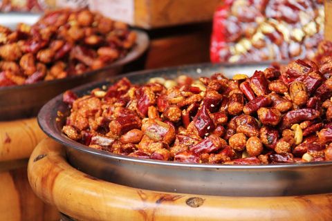 Sweet glazed nuts assortment tray exuding warmth and glaze