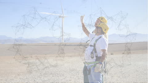 Engineers Exploring Wind Power with Advanced Network Technology Visualization