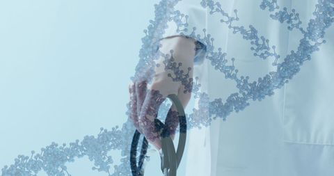 Doctor Holding Stethoscope with DNA Strand Overlay