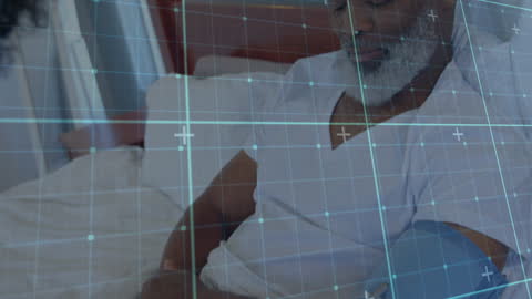 Senior Man in Hospital with Data Overlay Visualizing Health Technology