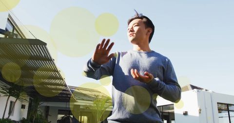 Man Experiencing Tranquility During Outdoor Exercise at Home