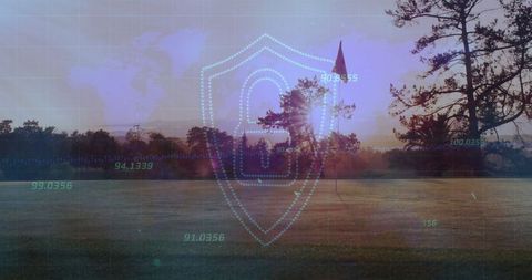 Digital shield overlay at sunset on grassy field