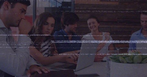 Creative Team Collaboration in Office with Digital Glitch Effect