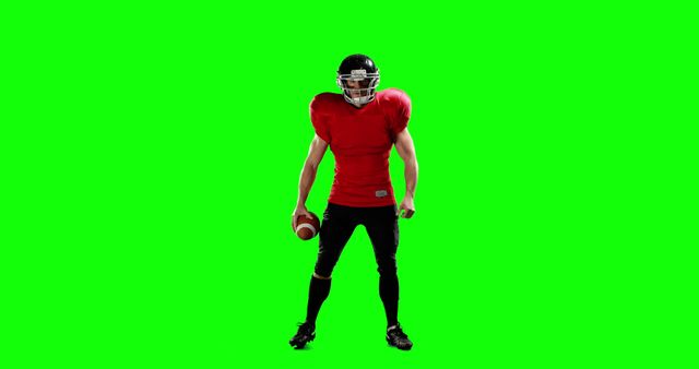 American football player holding ball on green screen - Download Free Stock Images Pikwizard.com