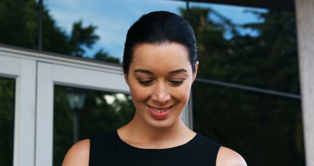 Businesswoman Smiling Outdoors Near Office Building - Download Free Stock Images Pikwizard.com