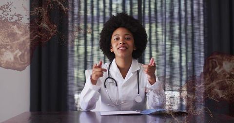 Confident Doctor Gesturing During Consultation in Modern Office