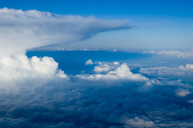 Aerial View of Majestic Clouds in Blue Sky - Download Free Stock Photos Pikwizard.com