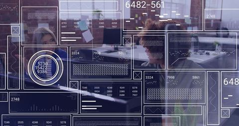 Collaborative team working with futuristic data HUD overlays in open-plan tech workspace