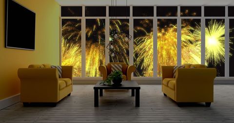 Cozy Modern Living Room With Vibrant Fireworks View