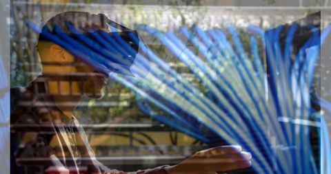Man using vr headset with digital network overlay concept