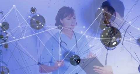 Medical Team Reviewing Digital Patient Data with Network Visualization and Analytics