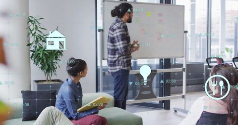 Business Team Analyzing Data with Eco and Financial Icons