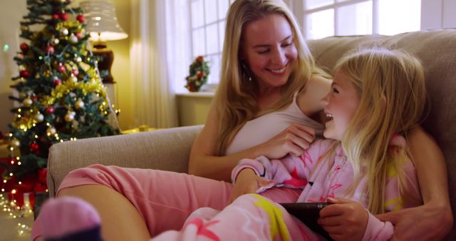 Happy Mother and Daughter Celebrating Christmas Together at Home - Download Free Stock Images Pikwizard.com