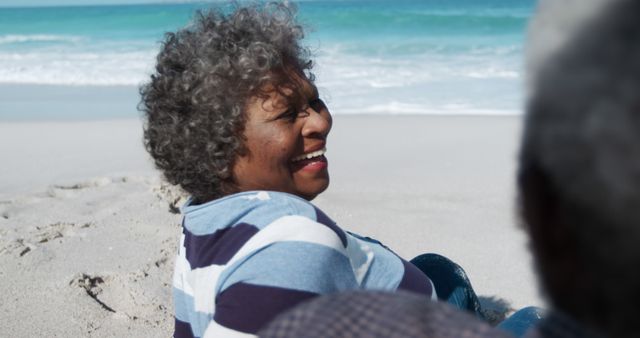 Happy Senior Woman Relaxing on Beach - Download Free Stock Images Pikwizard.com