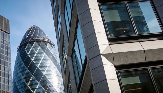 Egg-shaped glass tower reflected in geometric stone office corner, modern london skyline