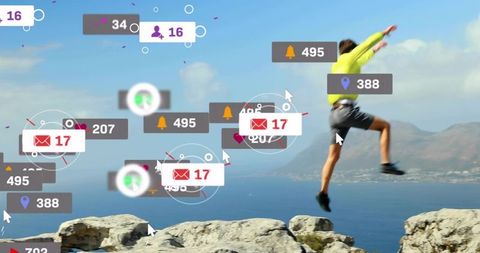 Leaping man in yellow top crossing coastal cliffs with notification overlays and cursors