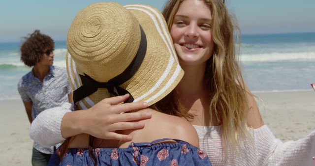 Friends Embracing and Enjoying Day at Beach - Download Free Stock Images Pikwizard.com