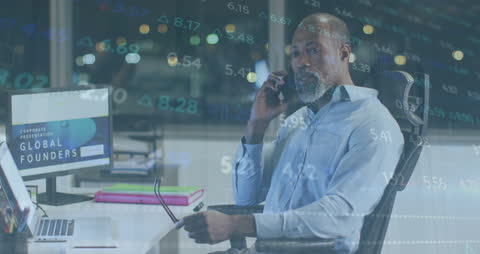 Businessman Analyzing Market Data on Smartphone in Office