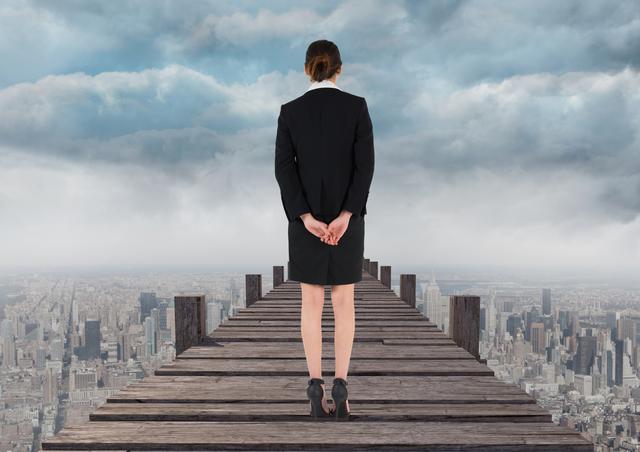 Digital composite image of businesswoman standing on pier with city background